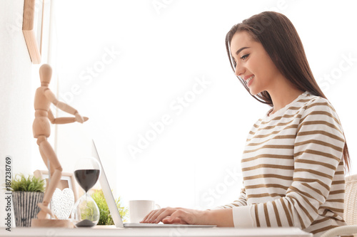 Young woman working with mo...