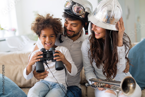 Young family being playful at home