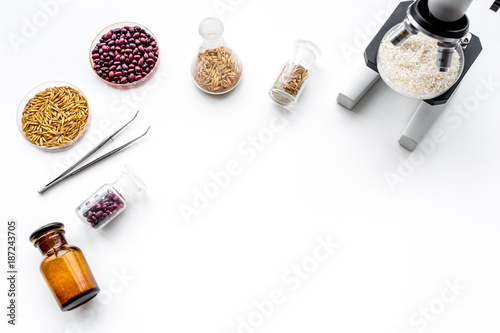 Food analysis. Rice under the microscope on white background top view copyspace