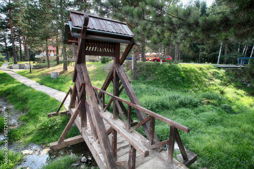 Small wooden bridge in the park on mountain.