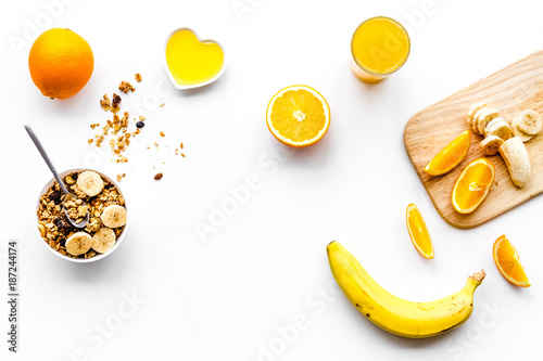 Healthy breakfast. Porridge with fruits and fresh juice. White background top view copyspace