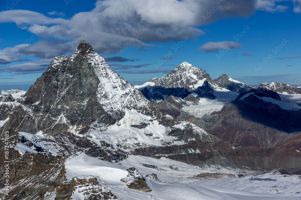 Winter panorama of mount Matterhorn covered with clouds, Canton of Valais, Alps, Switzerland 