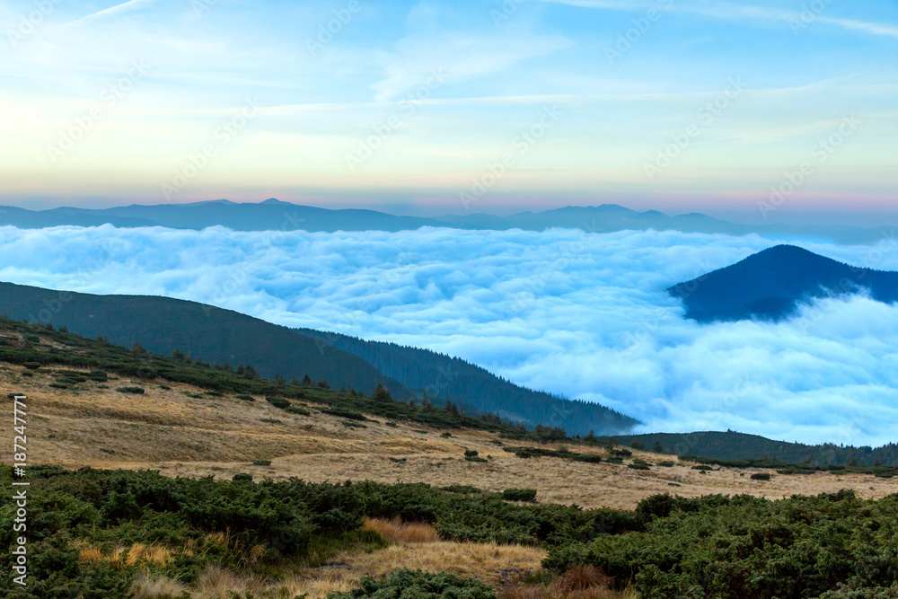 Fototapeta premium Spring Mountain View with Foggy Remote Ridges