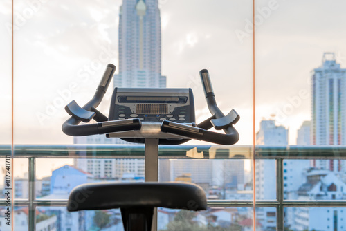exercise bike with city view in the window