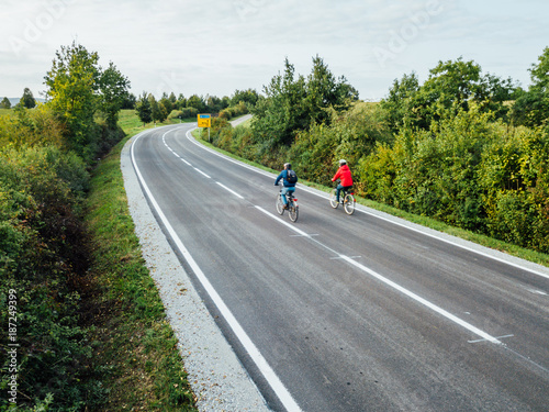 Cyclists on an empty road