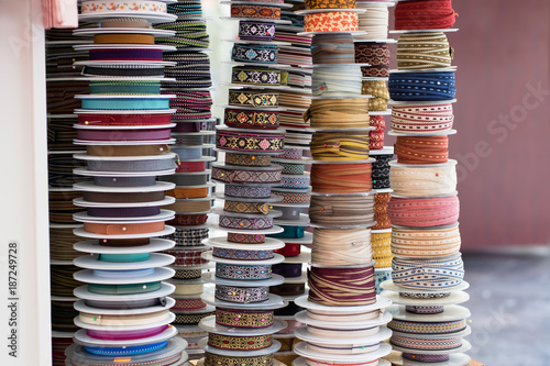 Grosgrain and another type of ribbons in a haberdashery.