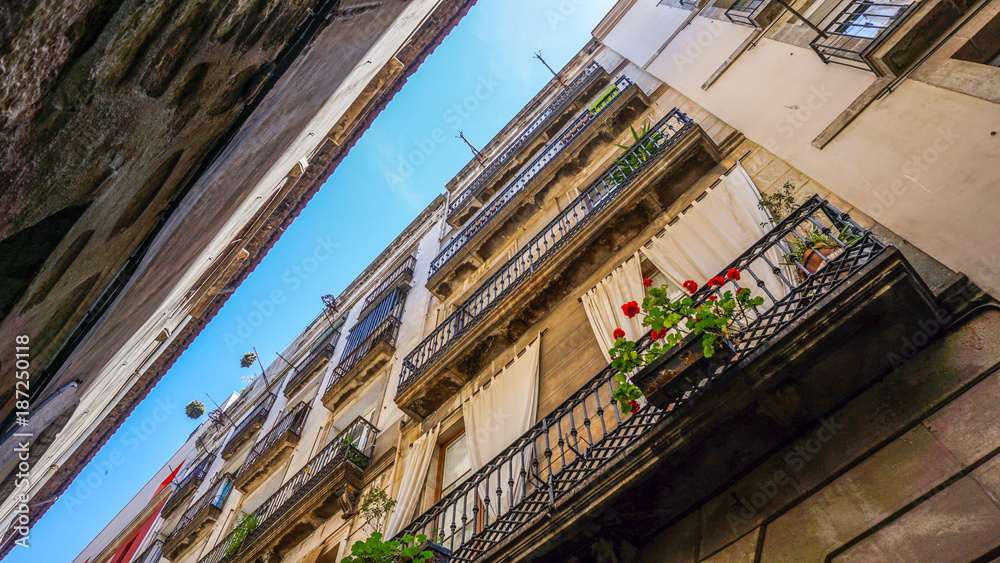 Looking up on streets of Barcelona, Spain