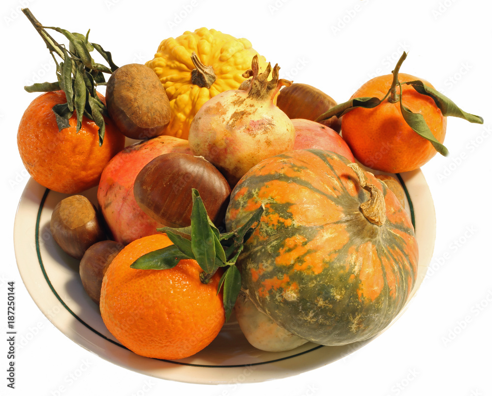 autumn centerpiece with pumpkins chestnuts and ripe oranges