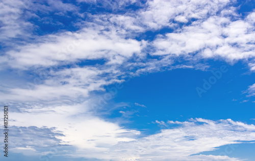 White clouds in blue sky.