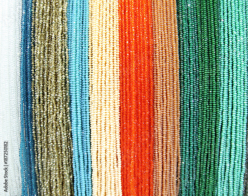 background of many necklaces with beads on sale