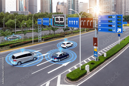 Smart car (HUD) , iot , Autonomous self-driving mode vehicle on metro city road iot concept with graphic sensor radar signal system and internet sensor connect. photo