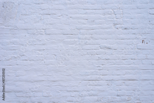 Brick wall whitewashed in white color - empty copy space background