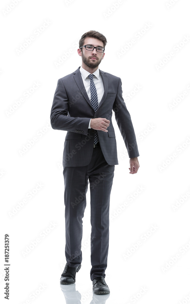 confident businessman goes forward. photo in full growth. confident businessman goes forward. photo in full growth.