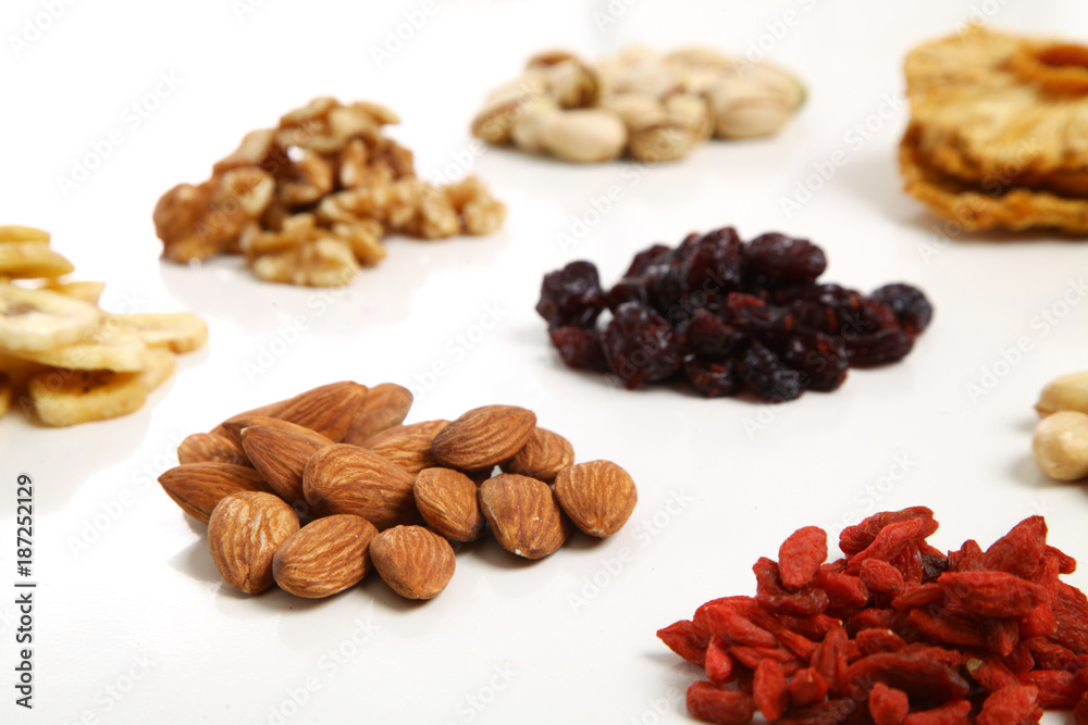 piles of Mixed dried fruits and nuts - symbols of jewish holiday Tu Bishvat piles of Mixed dried fruits and nuts - symbols of jewish holiday Tu Bishvat