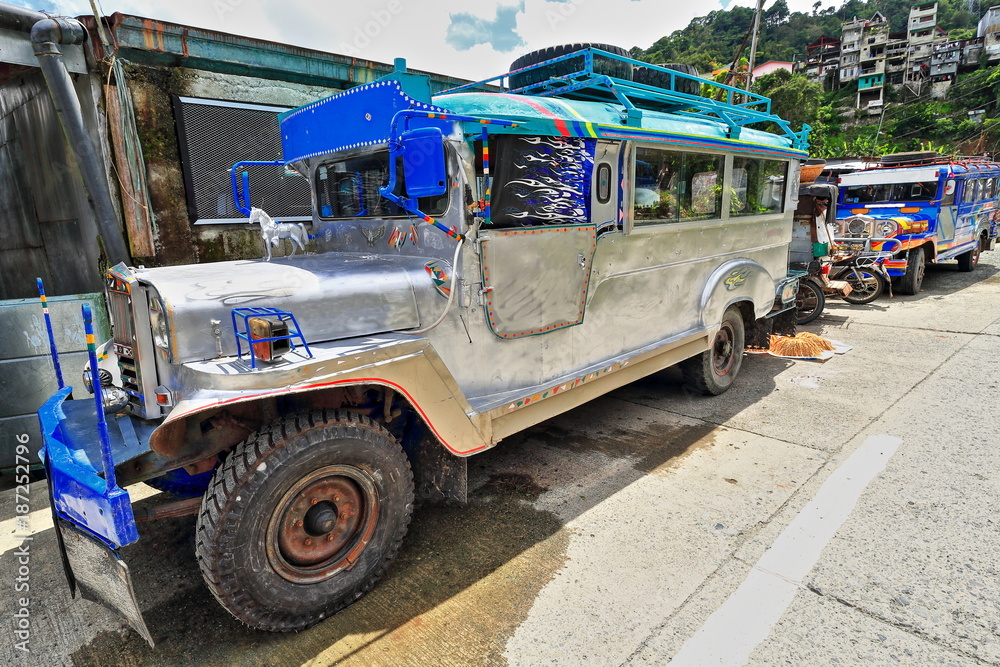Filipino grey-blue dyipni-jeepney car stationed in Banaue town-Ifugao province-Philippines. 0084