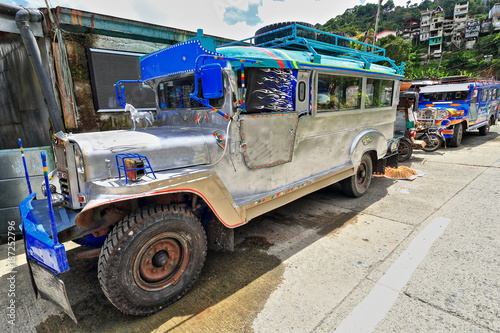 Filipino grey-blue dyipni-jeepney car stationed in Banaue town-Ifugao province-Philippines. 0084
