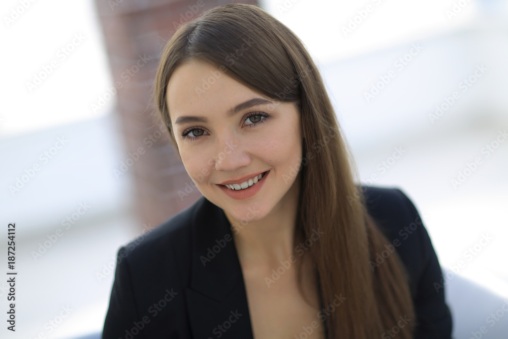 close up portrait of young business woman in modern office close up portrait of young business woman in modern office
