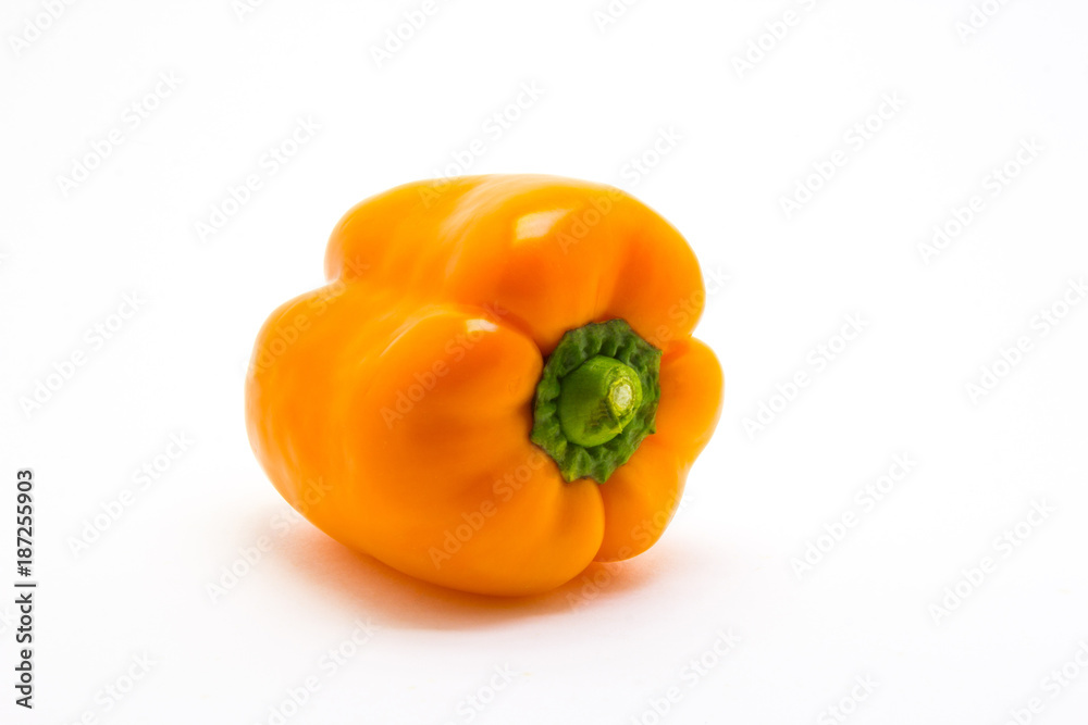 Orange pepper are isolated on a white background Orange pepper are isolated on a white background