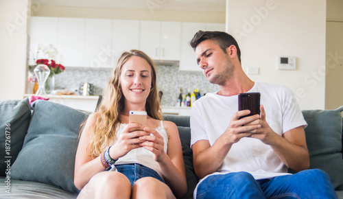 Jealous boyfriend controls the message phone of his girlfriend.