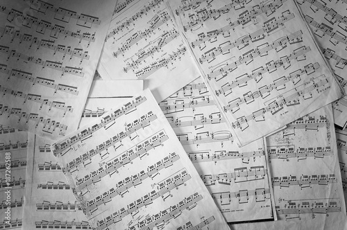 Notes, pentagrams and music. Black and white photo