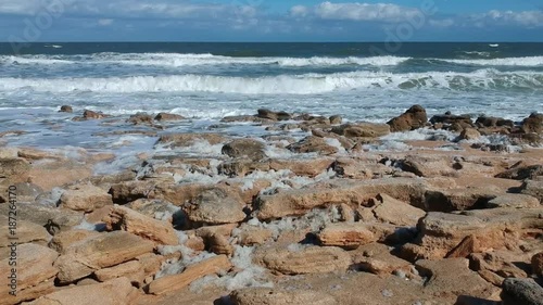 Rocky Beach with Foamy Waves