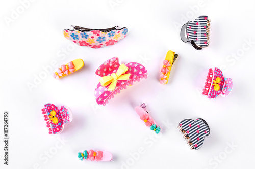 Collection of fashion hair clips. Set of different hairpins for little girls on white background.