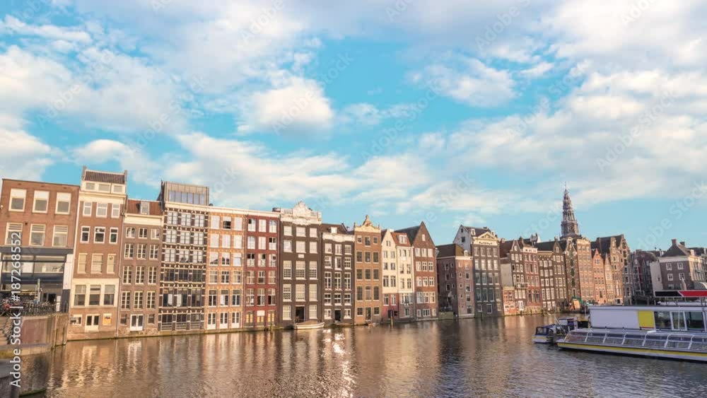 Amsterdam city skyline timelapse at Damrak canal waterfront, Amsterdam, Netherlands 4K Time Lapse Amsterdam city skyline timelapse at Damrak canal waterfront, Amsterdam, Netherlands 4K Time Lapse