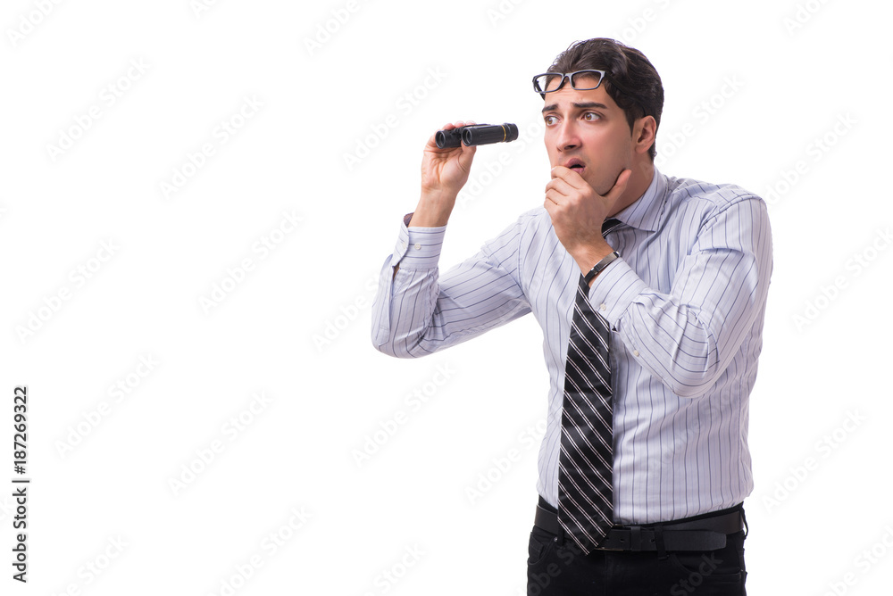 Young handsome businessman looking into future with binoculars