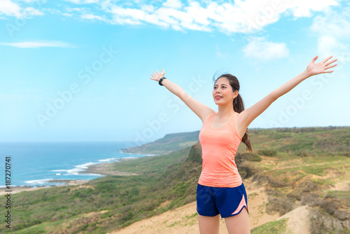 happy pretty woman runner going to running