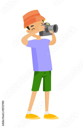 Young caucasian white smiling boy holding photo camera and taking pictures. Vector cartoon illustration isolated on white background.