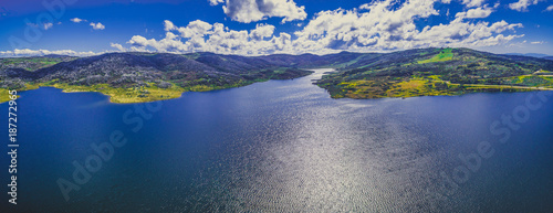Aerial panorama of Rocky Valley water storage on bright summer day. Victoria, Australia