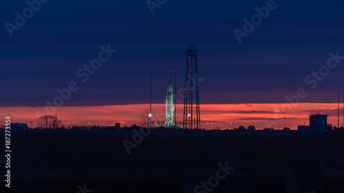 Sunrise over the Orbital ATK Antares rocket at NASA's Wallops Flight Facility