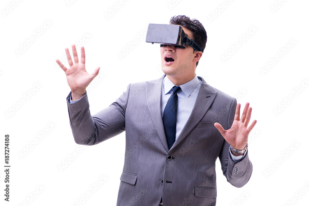 Businessman wearing virtual reality VR glasses isolated on white Businessman wearing virtual reality VR glasses isolated on white