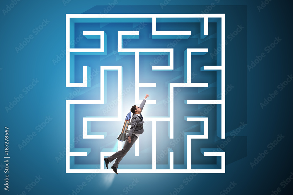 Uncertainty concept with businessman lost in maze labyrinth Uncertainty concept with businessman lost in maze labyrinth