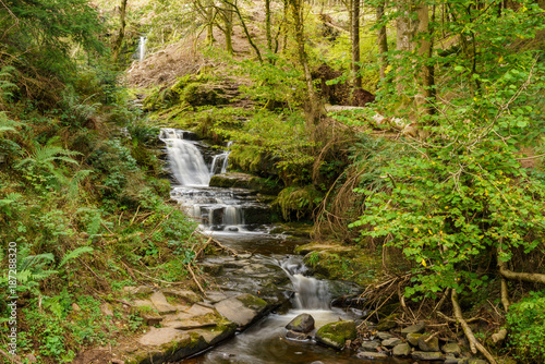 A waterfall in Blaen-y-glyn near Torpantau, Powys, Wales, UK photo