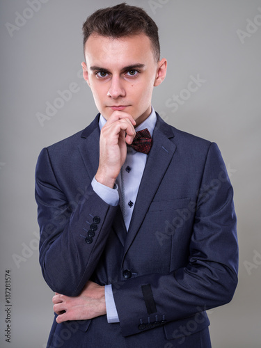 Young businessman in classic suit © Xalanx