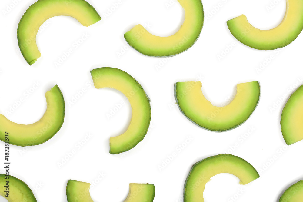 avocado slices isolated on white background. Top view. Flat lay pattern avocado slices isolated on white background. Top view. Flat lay pattern