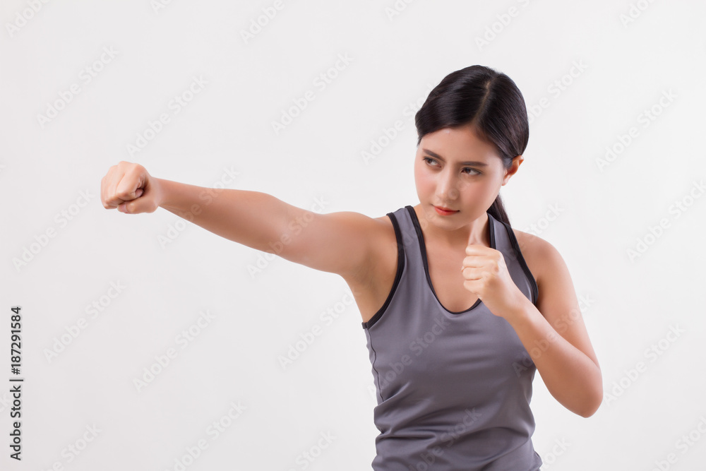 strong fitness woman punching isolated strong fitness woman punching isolated