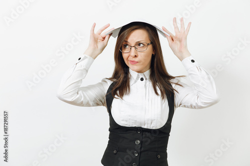 Shocked perplexed caucasian young brown-hair business woman in black suit white shirt glasses with work documents on head isolated on white background. Manager or worker. Copy space for advertisement.