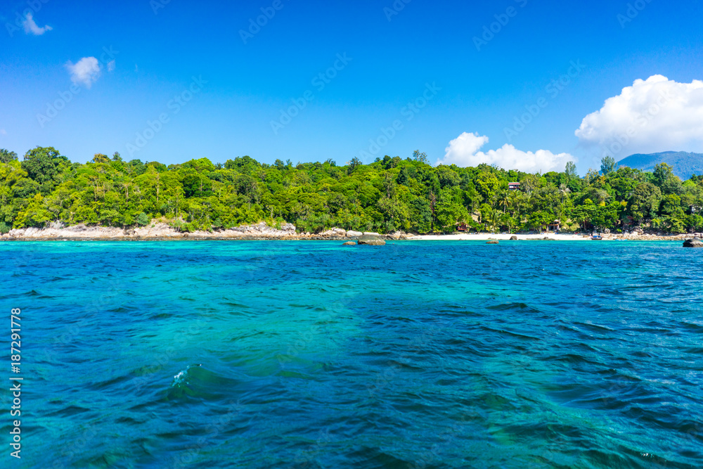 Beautiful green tropical island and transparent water in Lipe Island in a summer day.