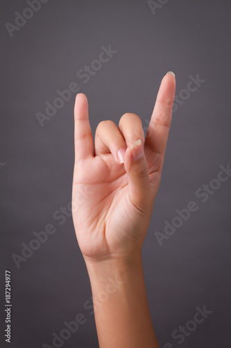 hand pointing up love or rock hand sign gesture