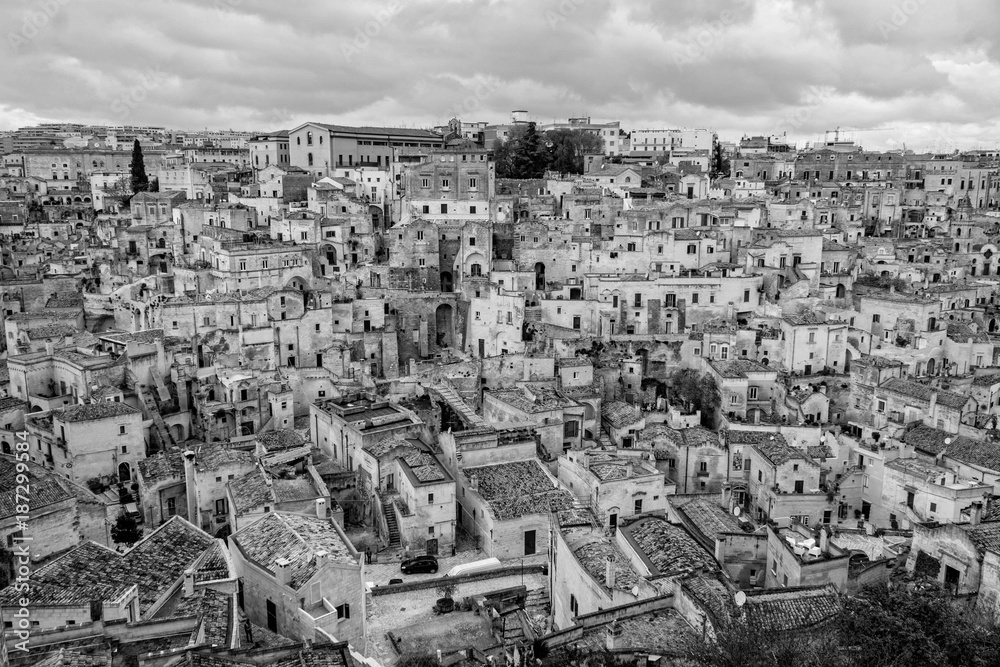 Matera the ancient city of Italy in Basilicata, view of its old stone houses and streets in black and white