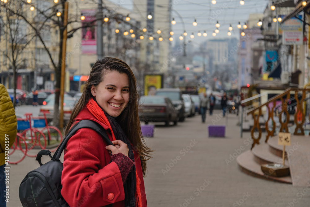 Fototapeta premium young woman portrait at city street