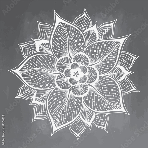 Doodle mandala flower on chalkboard. Outline floral design element. Decorative round flower. Anti-stress therapy pattern on black background. Meditation poster. Vector illustration
