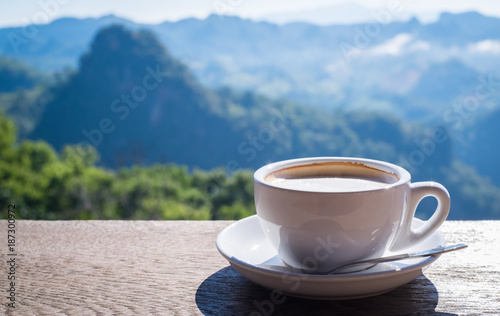 Coffee in White Cup and Mountain View