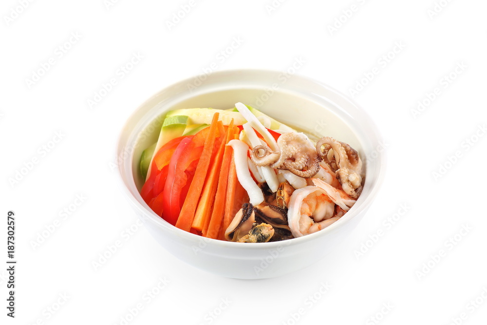 vegetables with seafood in a plate on a white background isolated vegetables with seafood in a plate on a white background isolated