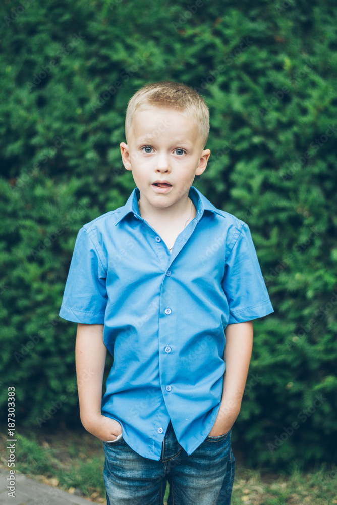 portrait of kid boy in park