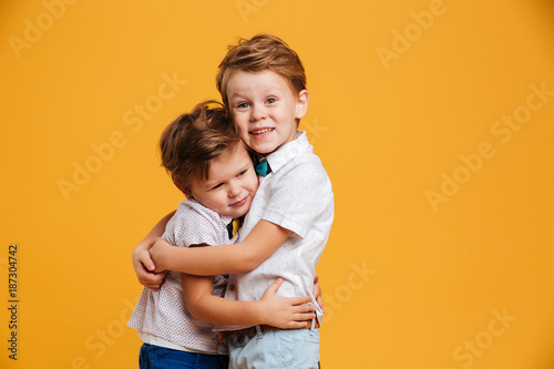 Happy little children brothers isolated