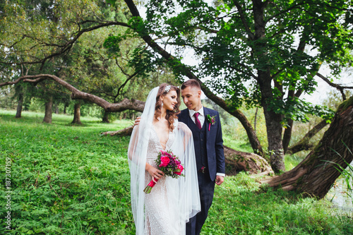 Sensual portrait of a young couple. Wedding photo outdoor