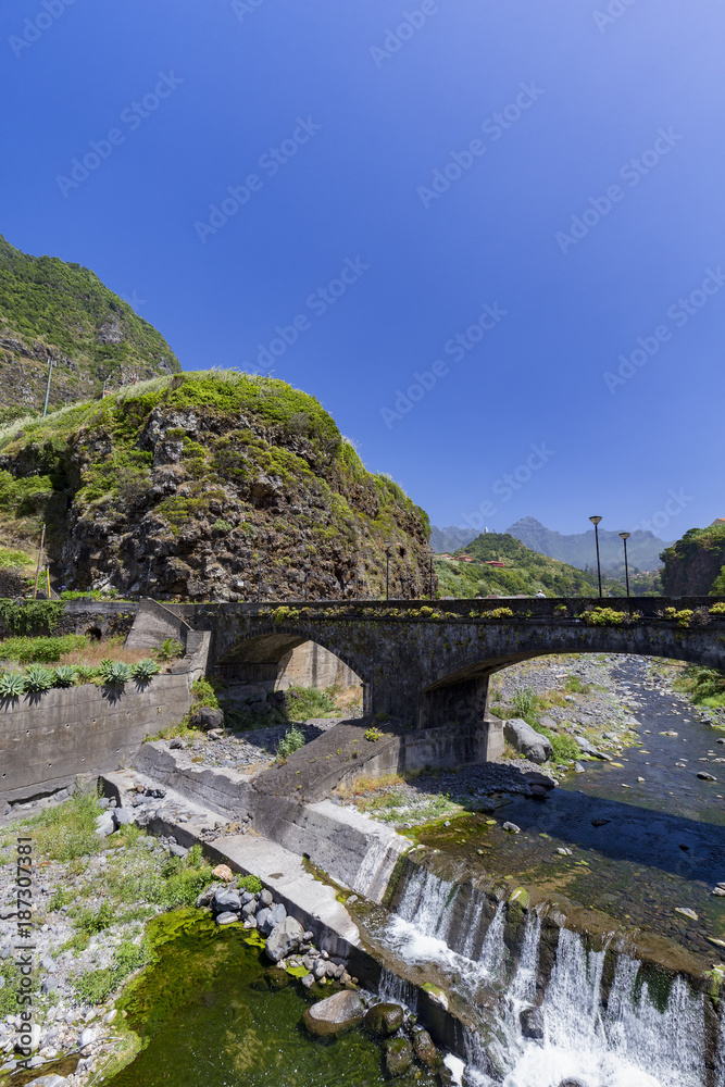 Portrait view of a bridge in the small village of Sao Vicente on the island of Madeira, Portugal.